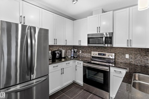 212 5151 Windermere Boulevard, Edmonton, AB - Indoor Photo Showing Kitchen With Double Sink With Upgraded Kitchen