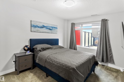 212 5151 Windermere Boulevard, Edmonton, AB - Indoor Photo Showing Bedroom