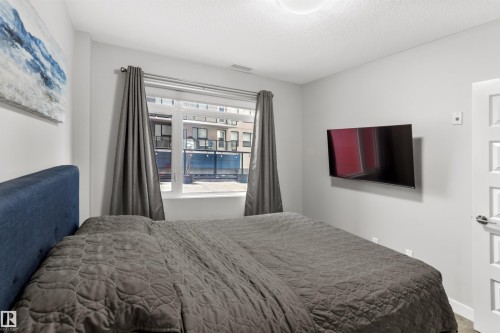 212 5151 Windermere Boulevard, Edmonton, AB - Indoor Photo Showing Bedroom