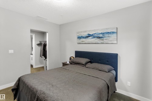 212 5151 Windermere Boulevard, Edmonton, AB - Indoor Photo Showing Bedroom