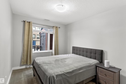 212 5151 Windermere Boulevard, Edmonton, AB - Indoor Photo Showing Bedroom