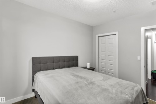 212 5151 Windermere Boulevard, Edmonton, AB - Indoor Photo Showing Bedroom