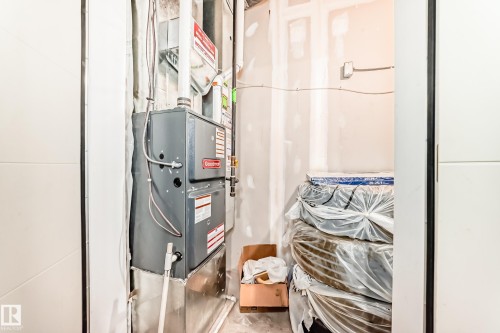 11 2560 Pegasus Boulevard, Edmonton, AB - Indoor Photo Showing Basement