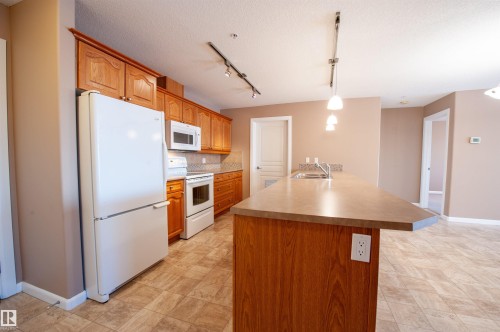 116 300 Palisades Way, Sherwood Park, AB - Indoor Photo Showing Kitchen With Double Sink