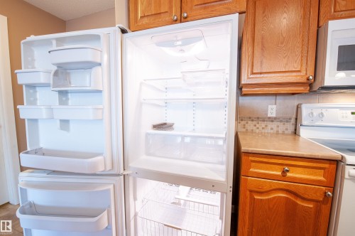 116 300 Palisades Way, Sherwood Park, AB - Indoor Photo Showing Kitchen With Double Sink