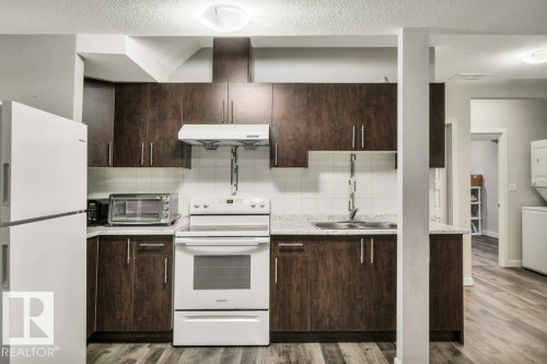 5121 1B Avenue, Edmonton, AB - Indoor Photo Showing Kitchen With Double Sink