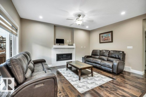 5121 1B Avenue, Edmonton, AB - Indoor Photo Showing Other Room With Fireplace