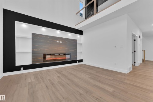 209 Basin Court, Leduc, AB - Indoor With Fireplace