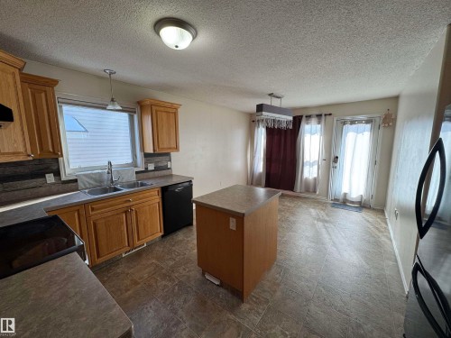 5741 48 Avenue, St. Paul Town, AB - Indoor Photo Showing Kitchen With Double Sink