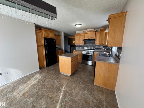 5741 48 Avenue, St. Paul Town, AB - Indoor Photo Showing Kitchen With Double Sink