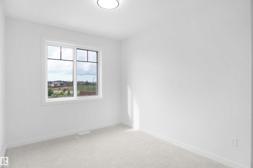 23 Trill Point(E), Spruce Grove, AB - Indoor Photo Showing Other Room