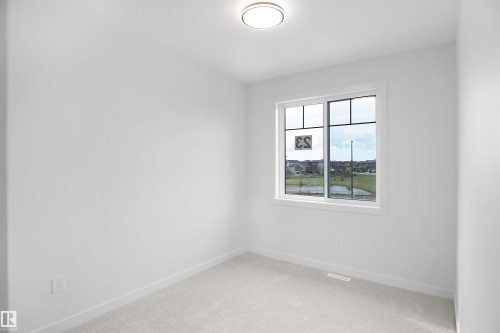 23 Trill Point(E), Spruce Grove, AB - Indoor Photo Showing Other Room