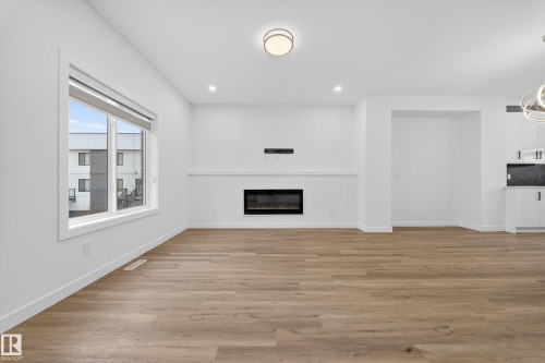 1 10 Salisbury Way, Sherwood Park, AB - Indoor With Fireplace