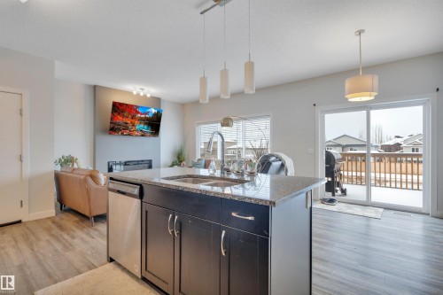 944 Berg Place, Leduc, AB - Indoor Photo Showing Kitchen With Double Sink
