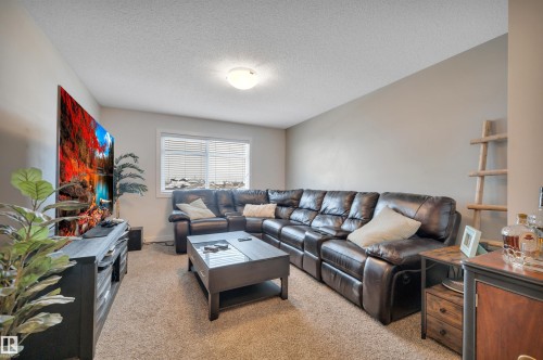 944 Berg Place, Leduc, AB - Indoor Photo Showing Living Room