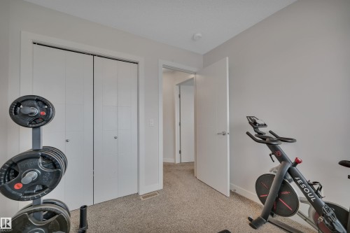 944 Berg Place, Leduc, AB - Indoor Photo Showing Gym Room