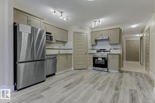 1820 34 Avenue, Edmonton, AB - Indoor Photo Showing Kitchen With Stainless Steel Kitchen