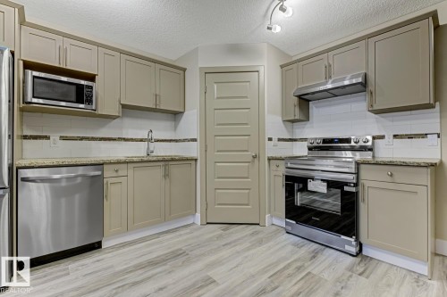 1820 34 Avenue, Edmonton, AB - Indoor Photo Showing Kitchen With Stainless Steel Kitchen