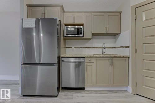 1820 34 Avenue, Edmonton, AB - Indoor Photo Showing Kitchen With Stainless Steel Kitchen