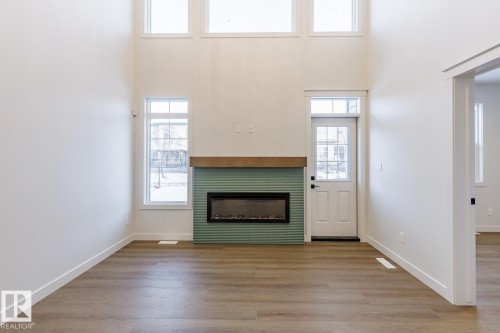 17537 62A Street, Edmonton, AB - Indoor Photo Showing Other Room With Fireplace