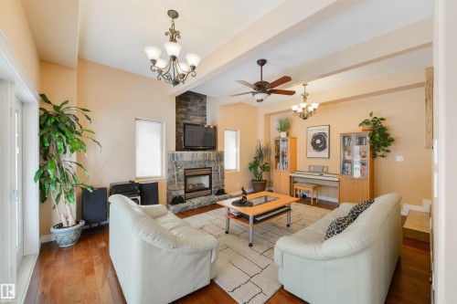 55 24524 Twp Road 544, Rural Sturgeon County, AB - Indoor Photo Showing Living Room With Fireplace