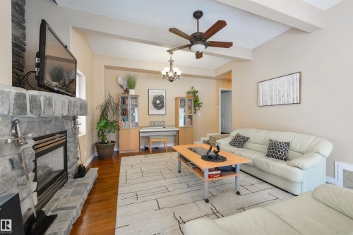 55 24524 Twp Road 544, Rural Sturgeon County, AB - Indoor Photo Showing Living Room With Fireplace