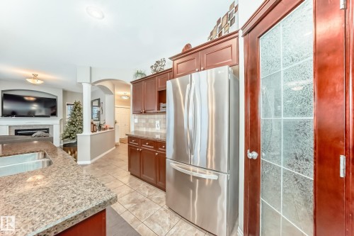 25 Woodbridge Link, Fort Saskatchewan, AB - Indoor Photo Showing Kitchen With Double Sink