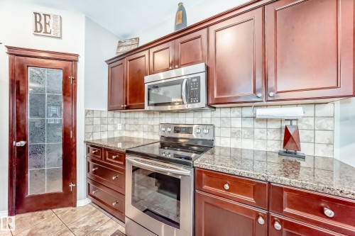 25 Woodbridge Link, Fort Saskatchewan, AB - Indoor Photo Showing Kitchen