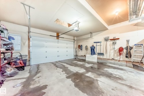 25 Woodbridge Link, Fort Saskatchewan, AB - Indoor Photo Showing Garage