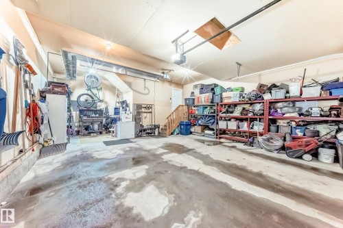 25 Woodbridge Link, Fort Saskatchewan, AB - Indoor Photo Showing Garage