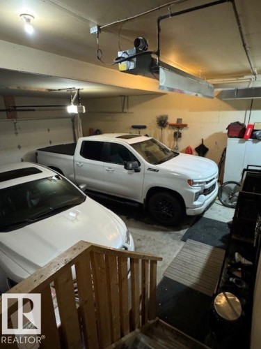 25 Woodbridge Link, Fort Saskatchewan, AB - Indoor Photo Showing Garage