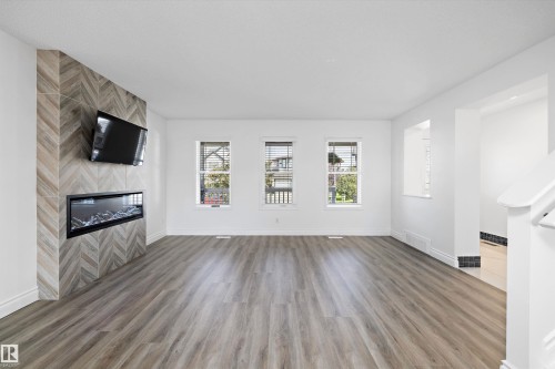 9852 217 Street Nw, Edmonton, AB - Indoor Photo Showing Living Room With Fireplace