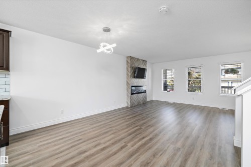 9852 217 Street Nw, Edmonton, AB - Indoor Photo Showing Living Room With Fireplace