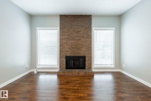 15003 58 Street, Edmonton, AB - Indoor Photo Showing Living Room With Fireplace