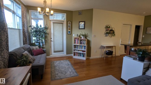 203 11140 68 Avenue, Edmonton, AB - Indoor Photo Showing Living Room