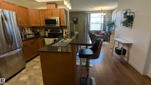 203 11140 68 Avenue, Edmonton, AB - Indoor Photo Showing Kitchen With Stainless Steel Kitchen