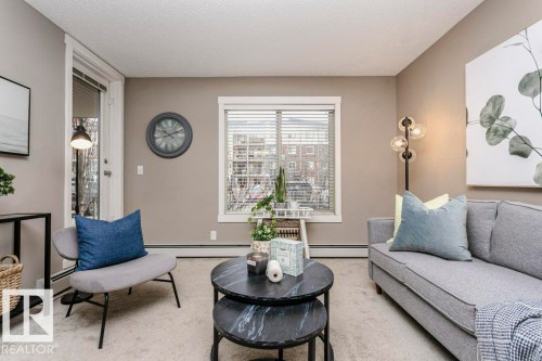 106 5816 Mullen Place, Edmonton, AB - Indoor Photo Showing Living Room