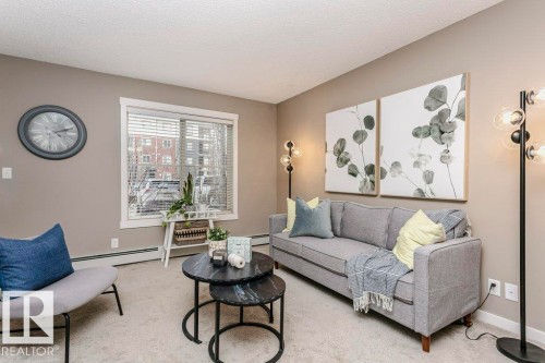 106 5816 Mullen Place, Edmonton, AB - Indoor Photo Showing Living Room