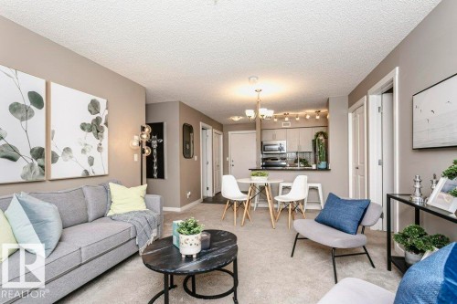 106 5816 Mullen Place, Edmonton, AB - Indoor Photo Showing Living Room