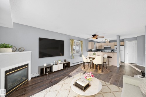 418 10403 98 Avenue, Edmonton, AB - Indoor Photo Showing Living Room With Fireplace