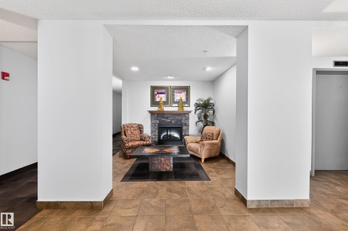 418 10403 98 Avenue, Edmonton, AB - Indoor With Fireplace