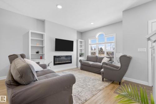 429 Pioneer Road, Spruce Grove, AB - Indoor Photo Showing Living Room With Fireplace