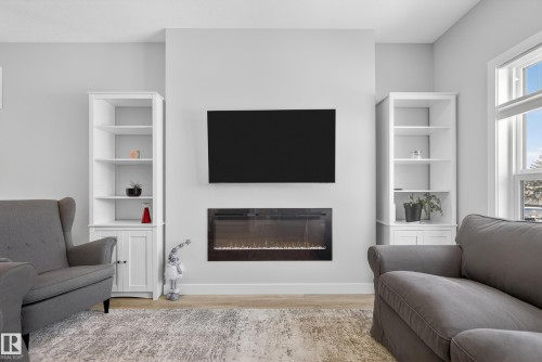 429 Pioneer Road, Spruce Grove, AB - Indoor Photo Showing Living Room With Fireplace