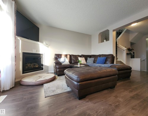 5424 204 Street, Edmonton, AB - Indoor Photo Showing Living Room With Fireplace