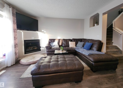 5424 204 Street, Edmonton, AB - Indoor Photo Showing Living Room With Fireplace