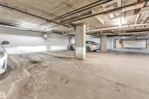 308 1080 Mcconachie Boulevard Nw, Edmonton, AB - Indoor Photo Showing Garage