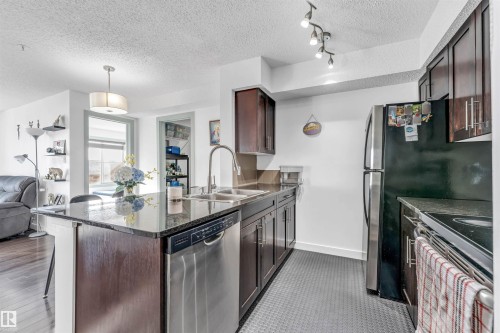 308 1080 Mcconachie Boulevard Nw, Edmonton, AB - Indoor Photo Showing Kitchen With Double Sink With Upgraded Kitchen