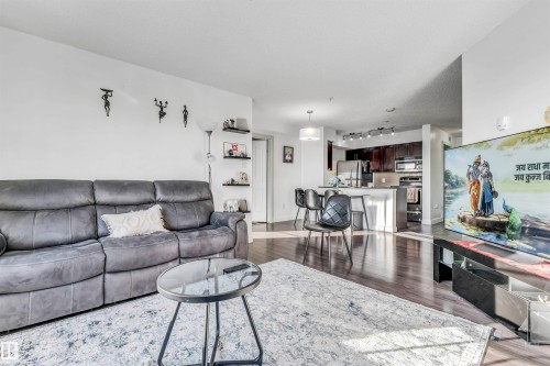 308 1080 Mcconachie Boulevard Nw, Edmonton, AB - Indoor Photo Showing Living Room