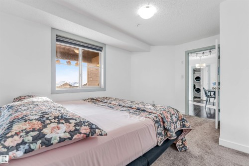 308 1080 Mcconachie Boulevard Nw, Edmonton, AB - Indoor Photo Showing Bedroom
