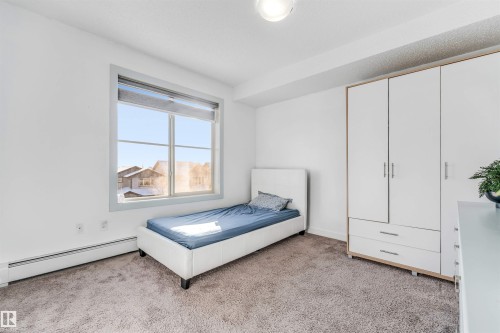 308 1080 Mcconachie Boulevard Nw, Edmonton, AB - Indoor Photo Showing Bedroom